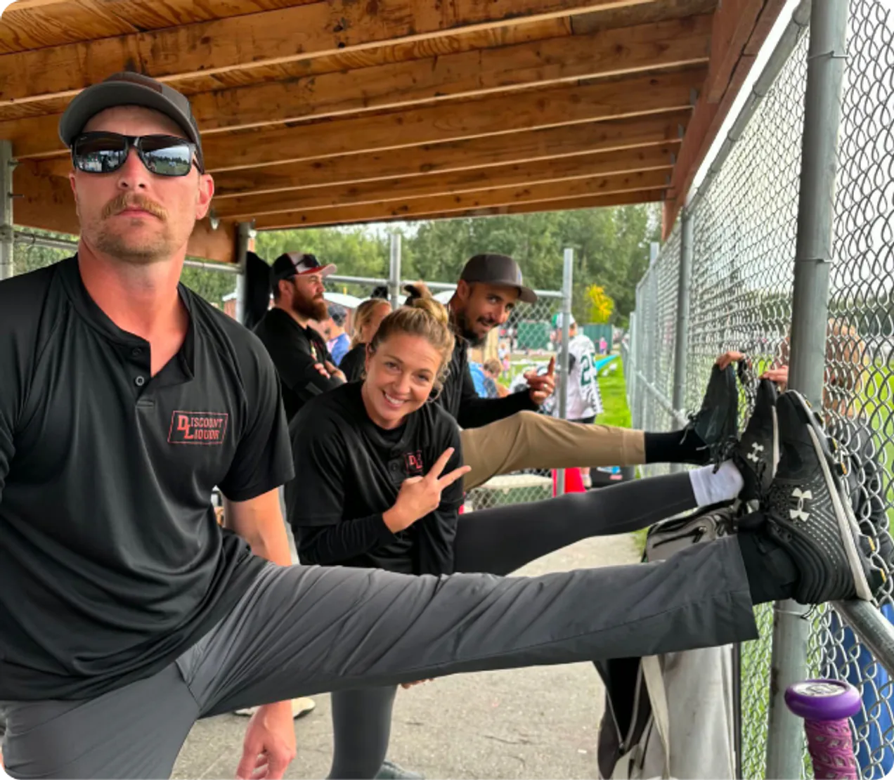 Firecracker tournament players in the dugout